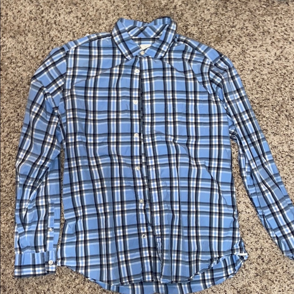 Long sleeve collared shirt.